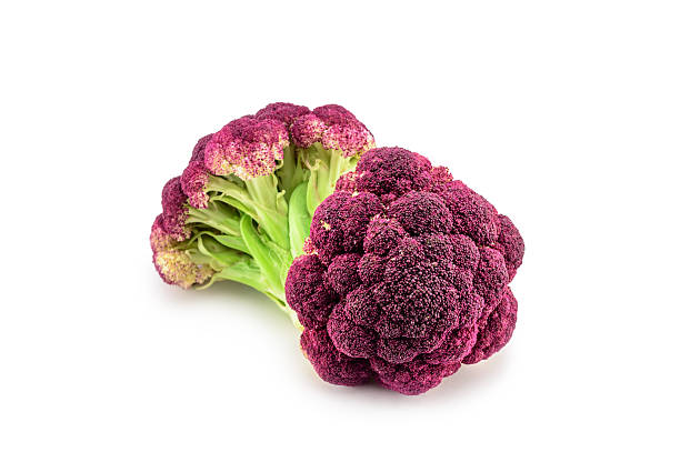 istock Purple cauliflower isolated on white. Selective focus 621925714
