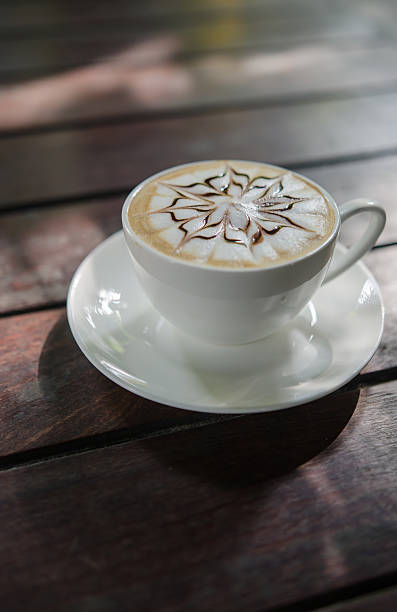 istock Barista making a cup of coffee soft focus image . 621927060