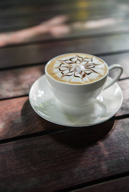 istock Barista making a cup of coffee soft focus image . 621927096