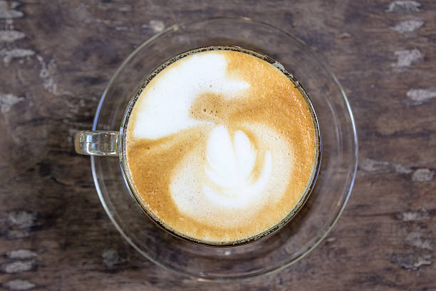 istock cup of latte coffee on wood table 621927126