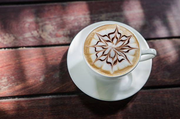 istock Barista making a cup of coffee soft focus image . 621927176