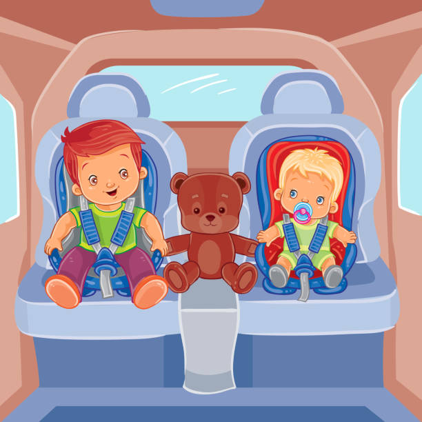 istock Two little boys sitting in child car seats 621928122