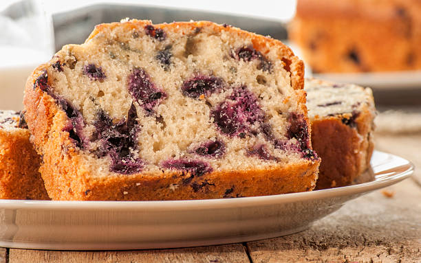 istock Home baked lemon cake with blueberries 621932306