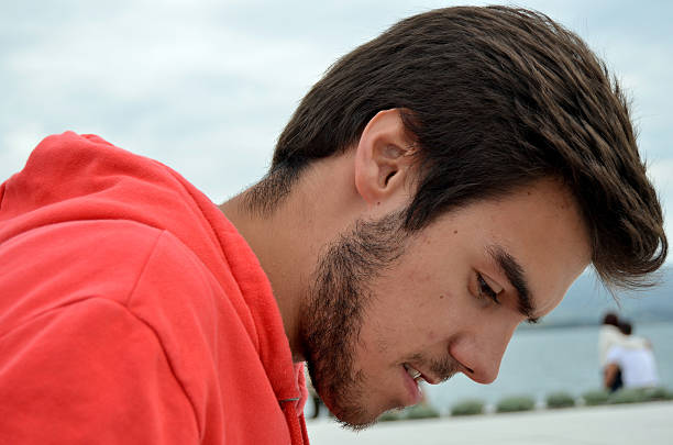 Portrait Of Man Against Black Background
