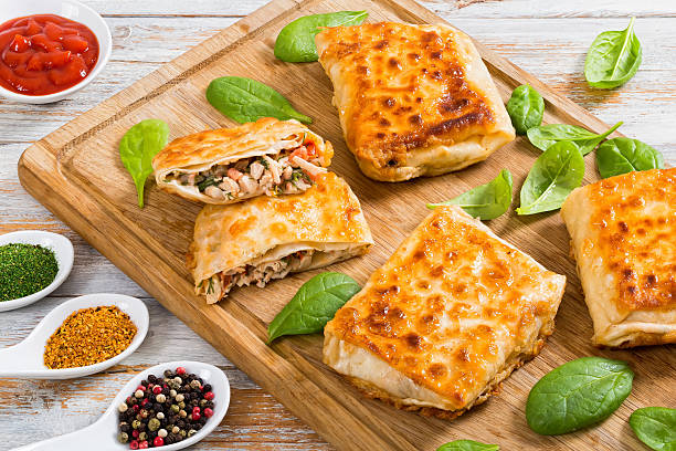 istock fried flatbread wraps Stuffed with chicken meat and vegetable 621935916