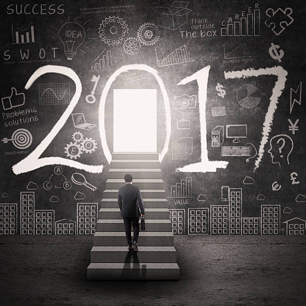 istock Businessman stepping to number 2017 621938298