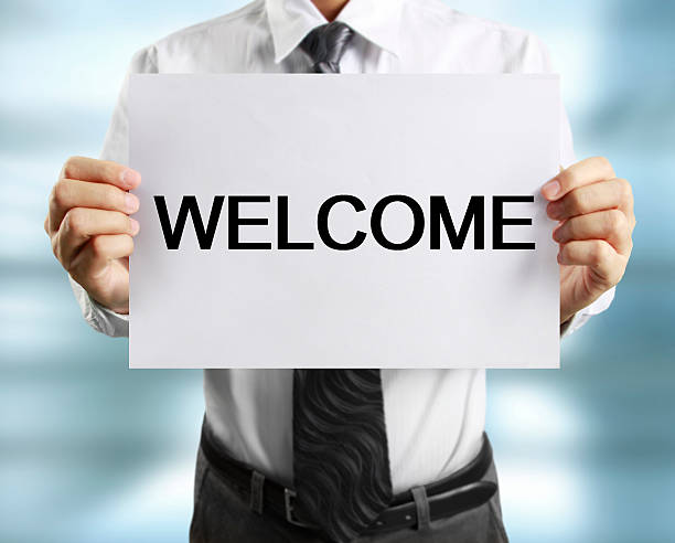 istock blank sheet of paper in  hand 621939684