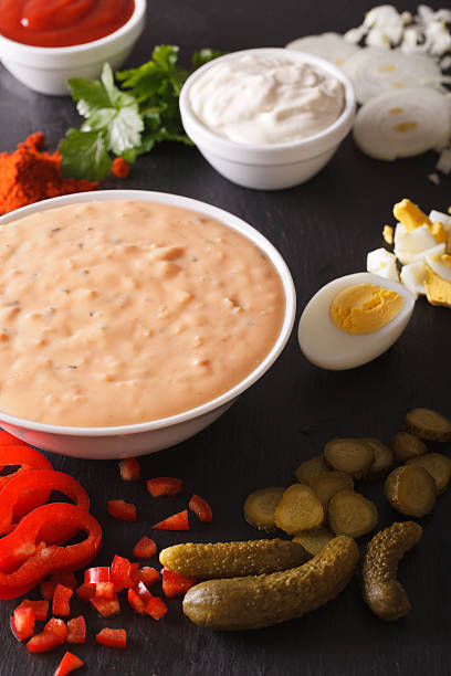 istock Dressing thousand islands surrounded by ingredients close-up 621973948