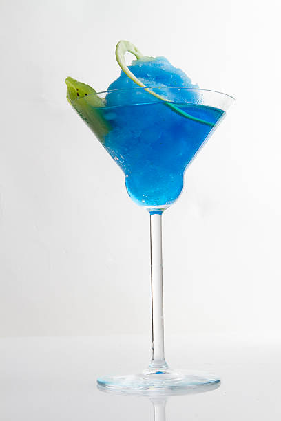 istock blue cocktail in martini glass 621974178