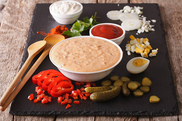 istock Thousand Island Dressing with ingredients on the slate board 621974300