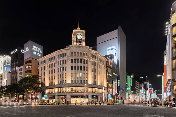 mitsukoshi ginza store in ginza, tokyo, japan at night - upmarket imagens e fotografias de stock