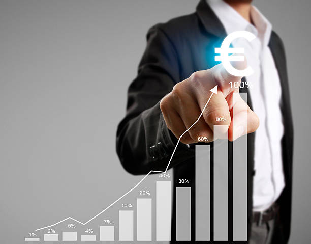 istock financial symbols coming from hand 621975136