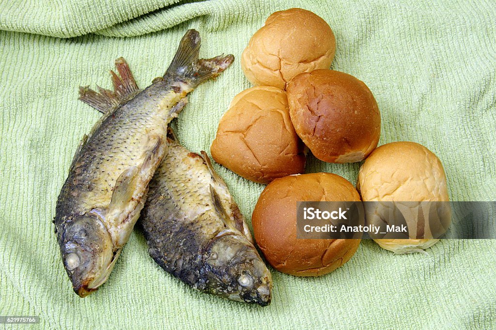 The five loaves, and the two fishes. Bible Stock Photo