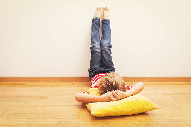 istock little boy relax at home 621975936