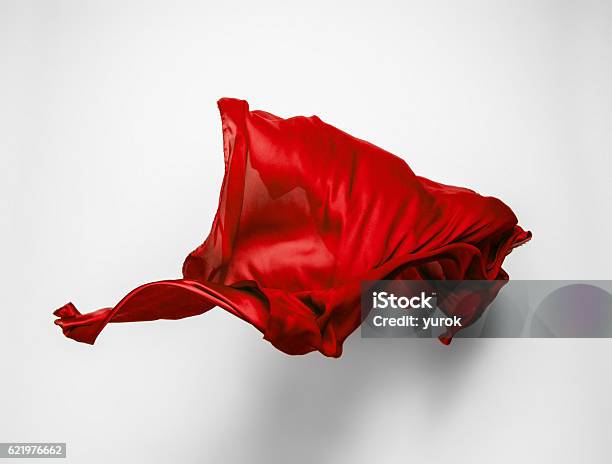 Abstract Red Fabric In Motion Stock Photo - Download Image Now - Textile, Red, Flying