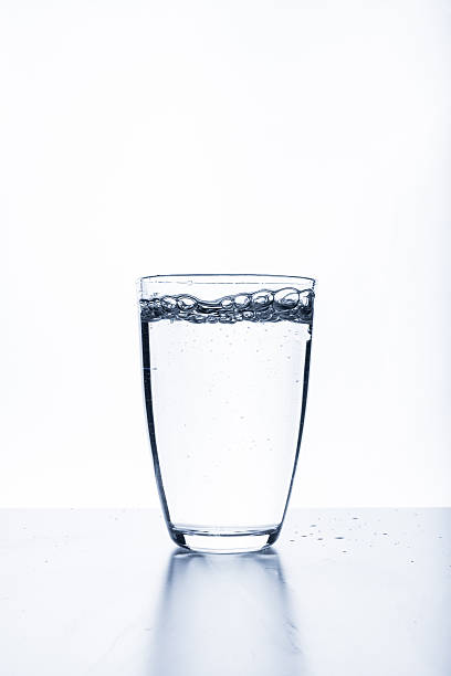 istock glass of water on white background 621979066