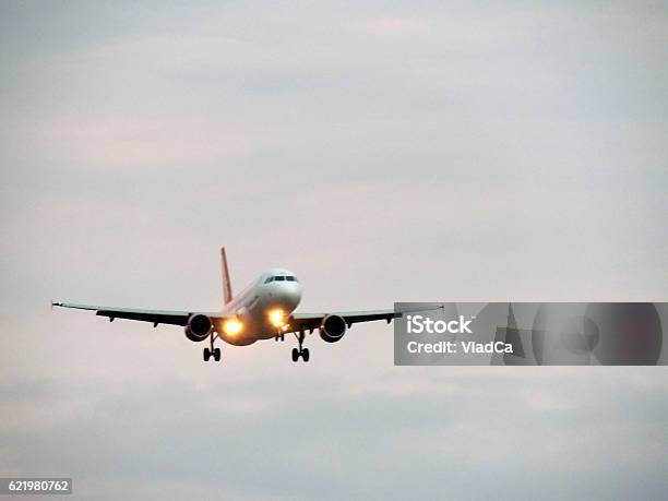 Airplane Landing At Manchester Airport Stock Photo - Download Image Now - Manchester International Airport, Airport, Manchester - England