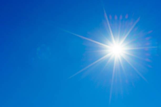 istock Clear blue sky and solar flare 621981276