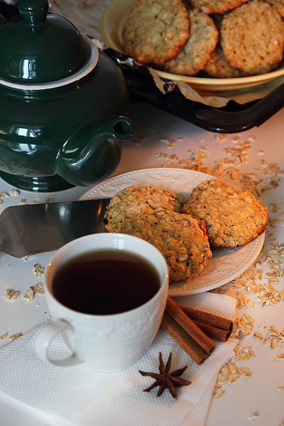 istock cooked oatmeal cookies and a cup of tea.. 621981434