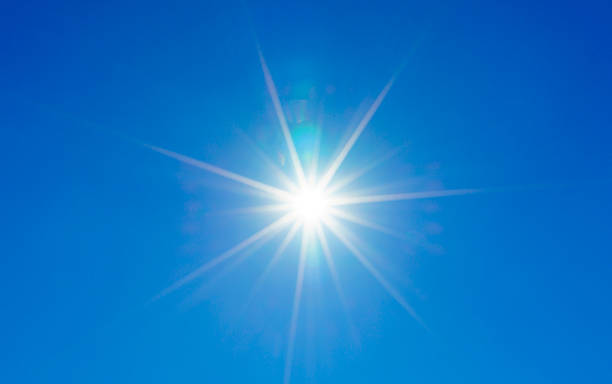 istock Clear blue sky and solar flare 621981482