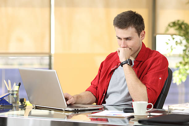 istock Entrepreneur working with a laptop at office 621986504
