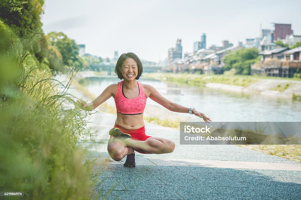 Japanese Bicycle Rider Doing Yoga By Kamo River Kyoto Japan Stock Photo -  Download Image Now - iStock