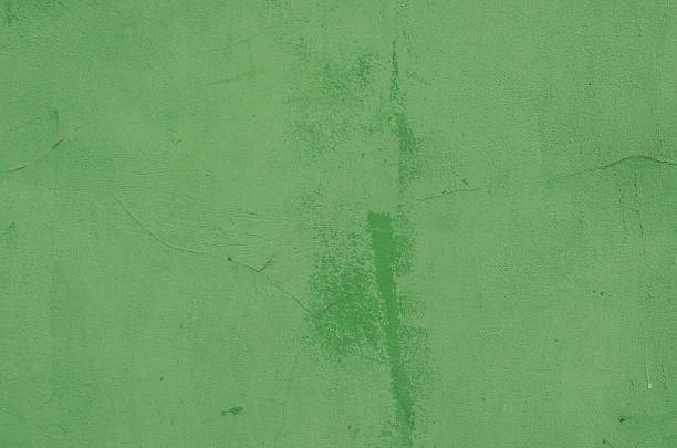 istock Vintage cement wall background with cracks and holes 621987604