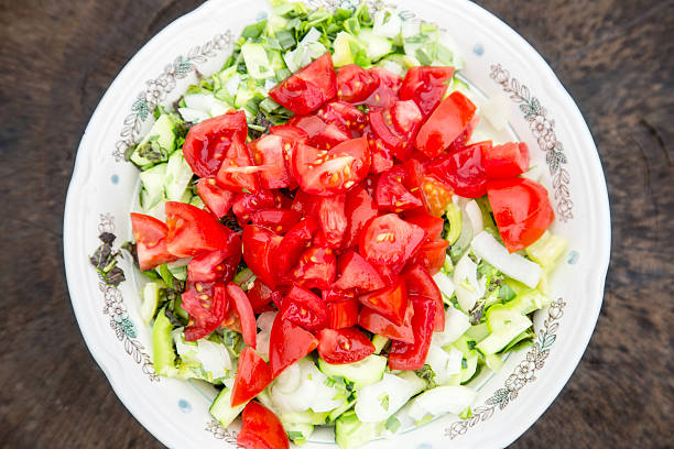 istock Salad of fresh tomatoes and cucumbers 621988286