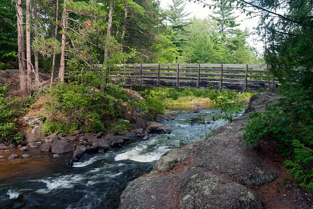 Wooden bridge over the Pike River near Dave's falls, Marinette County, Wisconsin, USA