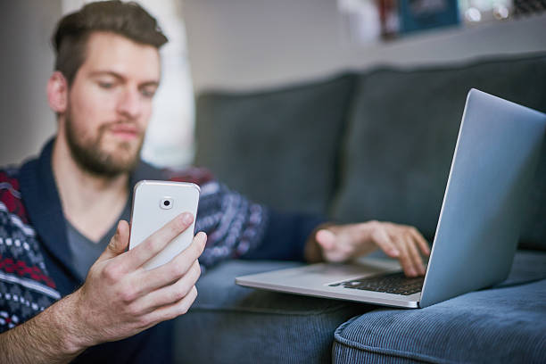 istock Connecting his devices to the wifi 621989424
