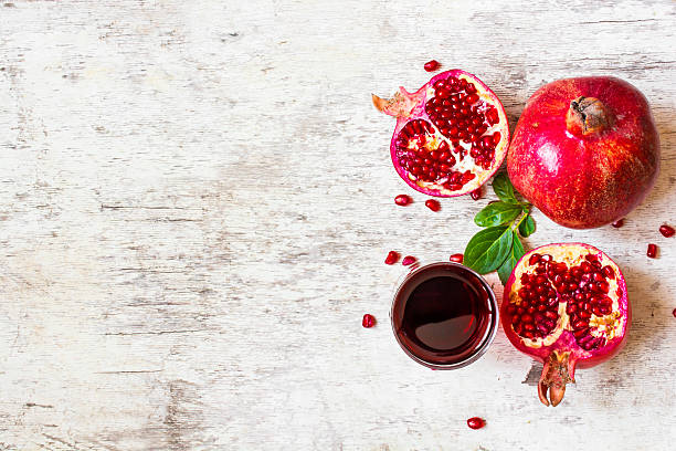 istock pomegranate juice with ripe pomegranate fruits 621991274
