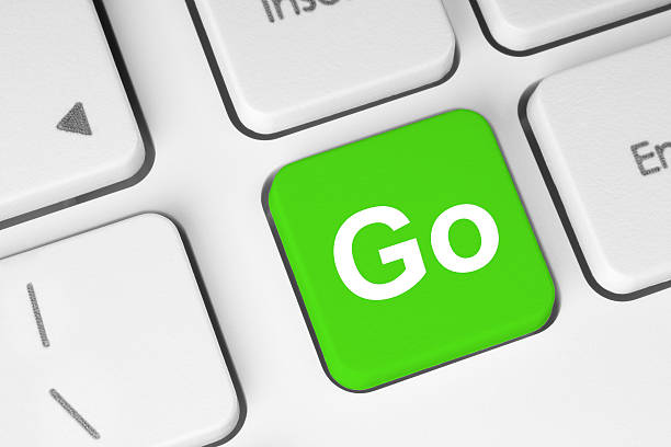 Go green button on keyboard stock photo