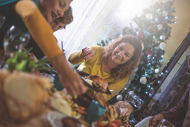 istock Family having Christmas dinner 621992930