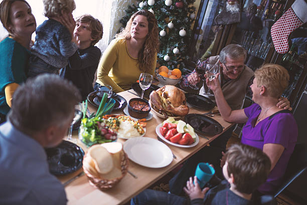 istock Family having Christmas dinner 621997508
