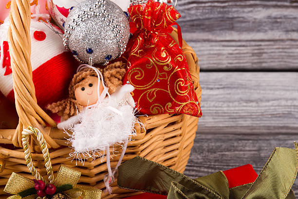istock Close-up of a wicker basket with Christmas decor. 621997862