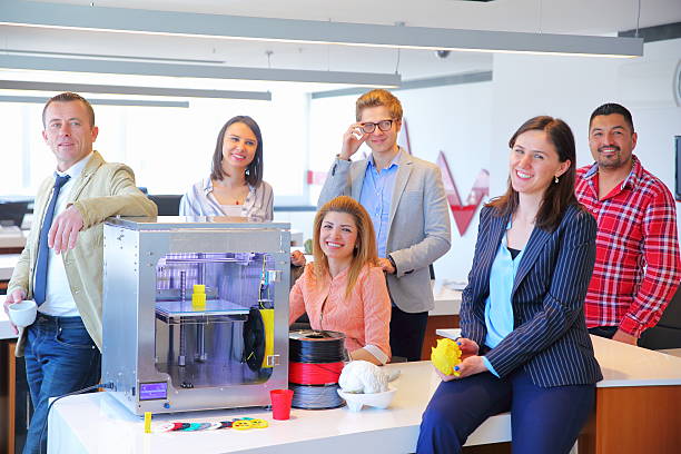 Young business people in office Business Team working in 3D printer office. 3d printing filament photos stock pictures, royalty-free photos & images