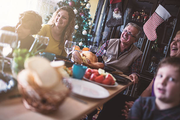 istock Family having Christmas dinner 621998288