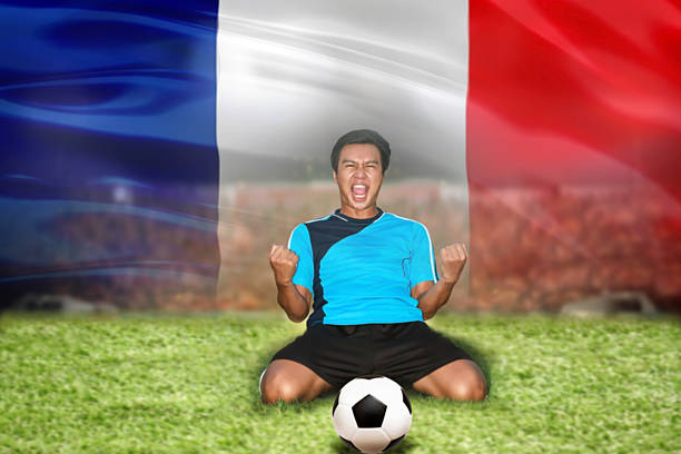 soccer football player young man happiness joy kneeling and socc - 海外サッカー 個照片及圖片檔