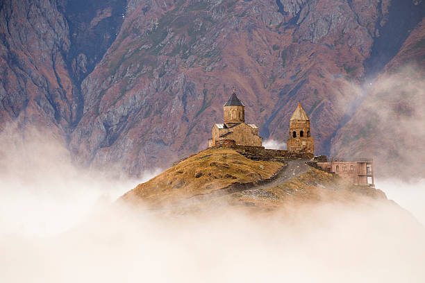 istock Gergeti Church in fog 622000350