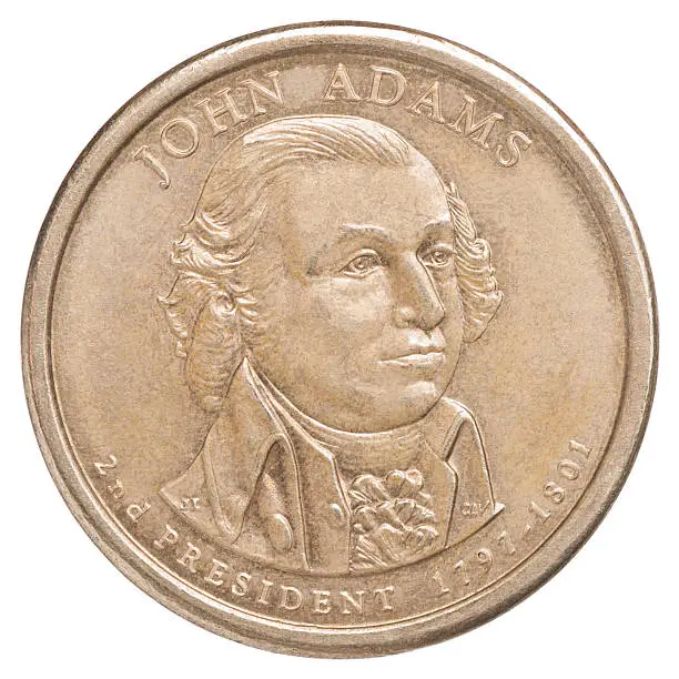 One US dollar coin with a portrait of the second president, John Adams