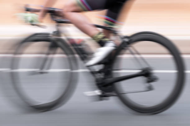 istock Blurred background of a man riding bicycle. 622000940