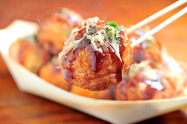 takoyaki takoyaki is Japanese food takoyaki photos stock pictures, royalty-free photos & images