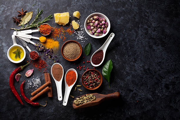 istock Herbs and spices over black stone 622004854