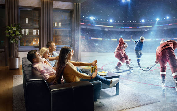 istock Students watching very realistic Ice hockey game at home 622005082