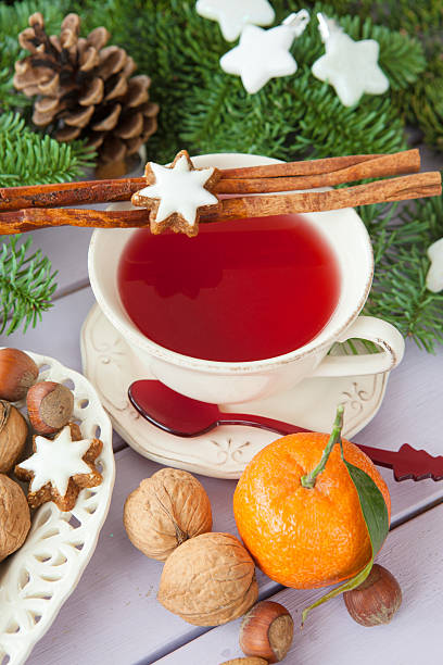 istock Mug of tea with christmas cookies 622005508