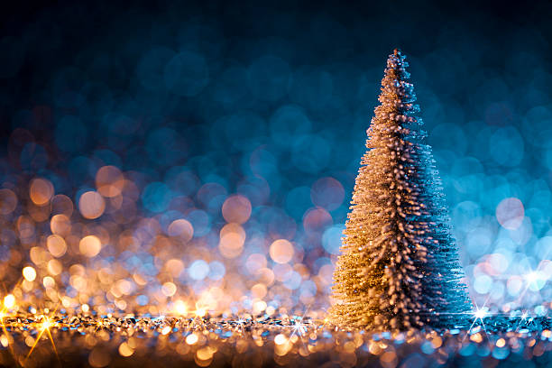 istock Christmas tree on defocused lights. Decorations Blue Gold 622010054