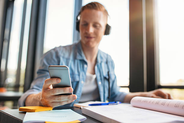 Library Study Phone 1,800+ Public Library Desk Stock Photos, Pictures & Royalty-Free Images ...