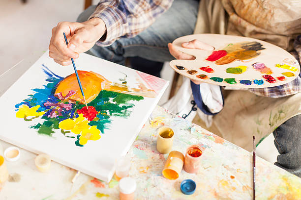 istock Hand of fine art painter creating new artwork-hight angle view 622014098