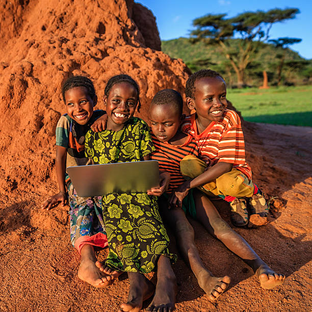 istock Little African children using laptop, East Africa 622014552