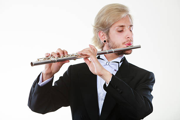 istock Male flutist wearing tailcoat plays flute 622015356